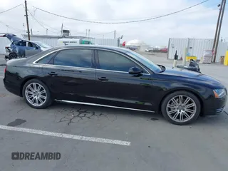 2013 Audi A8 3.0L with VIN WAURGAFD3DN005931, listed as a IAAI auction lot 42461062 with 113,899 mi miles and . Bid and sale history available at DreamBid. Image 13.