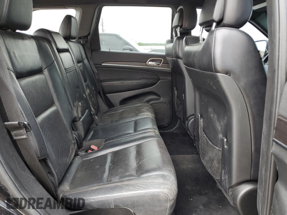 2014 Jeep Grand Cherokee Limited with VIN 1C4RJFBG0EC517032, listed as a Copart auction lot 58813355 with 173,616 mi miles and Salvage title. Bid and sale history available at DreamBid. Image 11.