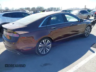 2019 Lincoln MKZ Reserve II z VIN 3LN6L5E99KR623668, wystawiony jako IAAI lot #41822730 z przebiegiem 13 609 mil mil oraz . Historia ofert i sprzedaży dostępna na DreamBid. Obrazek 4.