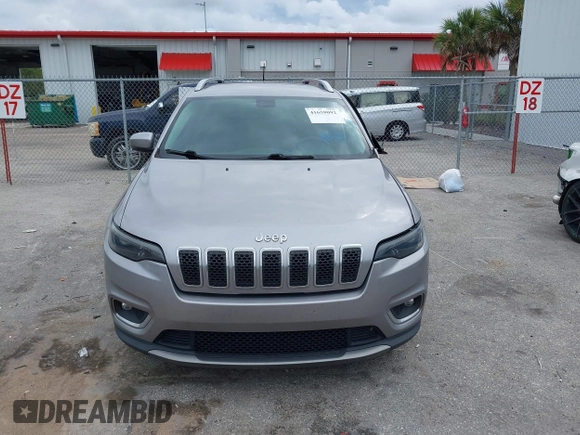 2020 Jeep Cherokee Limited with VIN 1C4PJLDB2LD560723, listed as a IAAI auction lot 41658092 with 73,978 mi miles. Bid and sale history available at carsss.com. Image 12.