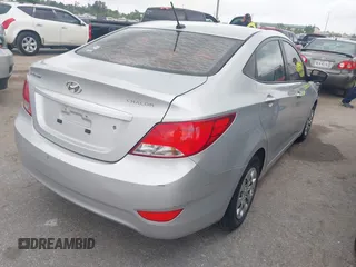 2015 Hyundai Accent GLS with VIN KMHCT4AE7FU930948, listed as a IAAI auction lot 42171213 with 150,543 mi miles and . Bid and sale history available at carsss.com. Image 4.