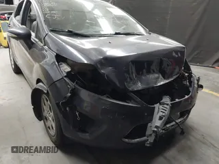 2013 Ford Fiesta SE z VIN 3FADP4BJ1DM186232, wystawiony jako IAAI lot #42304613 z przebiegiem 105 919 mil mil oraz . Historia ofert i sprzedaży dostępna na DreamBid. Obrazek 6.