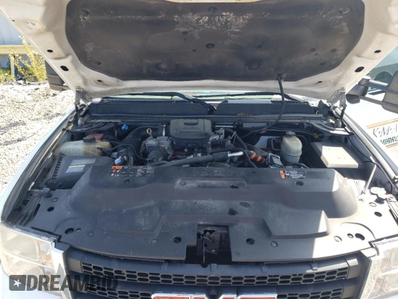 2013 GMC Sierra 3500HD Work Truck z VIN 1GD512C86DZ409861, wystawiony jako Copart lot #66929764 z przebiegiem 218 451 mil mil oraz Nie do naprawy. Historia ofert i sprzedaży dostępna na DreamBid. Obrazek 11.