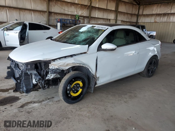 2015 Volkswagen Eos Komfort с VIN WVWBW8AH9FV001976, выставлен на аукционе Copart как лот 59529925 с пробегом 54 520 миль миль и Списание • Salvage title. История ставок и продаж доступна на DreamBid. Изображение 1.