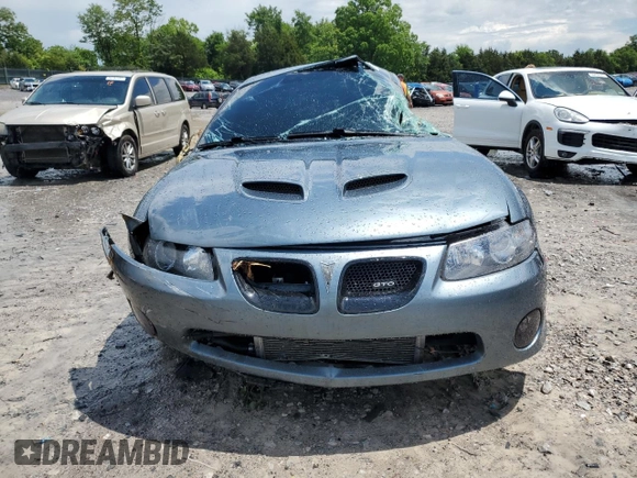 2005 Pontiac GTO z VIN 6G2VX12UX5L352121, wystawiony jako Copart lot #56840425 z przebiegiem 42 265 mil mil oraz Szkoda całkowita • Salvage title. Historia ofert i sprzedaży dostępna na DreamBid. Obrazek 5.