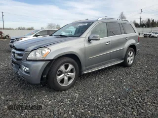2011 Mercedes-Benz GL-Class GL 450 with VIN 4JGBF7BE8BA692431, listed as a Copart auction lot 46718945 with 114,632 mi miles and Salvage Title. Bid and sale history available at carsss.com. Image 1.