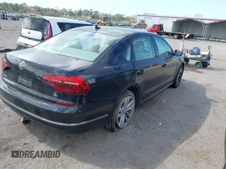 2019 Volkswagen Passat 2.0T Wolfsburg Edition with VIN 1VWLA7A34KC012694, listed as a IAAI auction lot 41579392 with 80,846 mi miles. Bid and sale history available at carsss.com. Image 4.