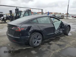 2023 Tesla Model 3 with VIN 5YJ3E1EA1PF677592, listed as a Copart auction lot 47621875 with 12,247 mi miles and Salvage Title. Bid and sale history available at DreamBid. Image 3.