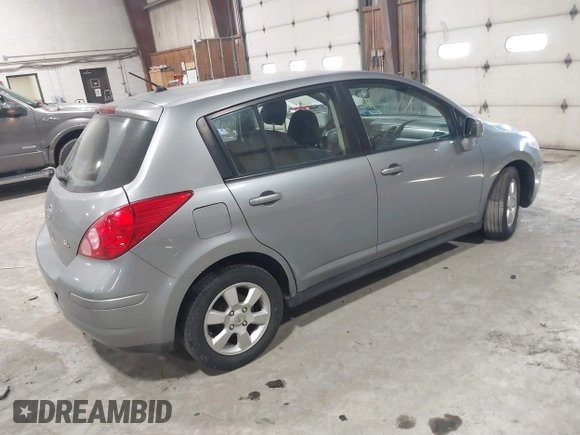 2009 Nissan Versa 1.8 SL with VIN 3N1BC13E99L409551, listed as a IAAI auction lot 41628375 with 214,873 mi miles. Bid and sale history available at carsss.com. Image 4.