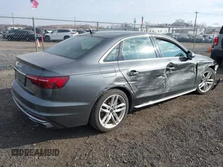 2022 Audi A4 S line Premium Plus z VIN WAUEAAF41NN015360, wystawiony jako IAAI lot #41320262 z przebiegiem 63 275 mil mil oraz . Historia ofert i sprzedaży dostępna na DreamBid. Obrazek 4.