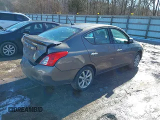 2014 Nissan Versa SV with VIN 3N1CN7AP9EL819833, listed as a IAAI auction lot 41351616 with 109,956 mi miles. Bid and sale history available at carsss.com. Image 4.