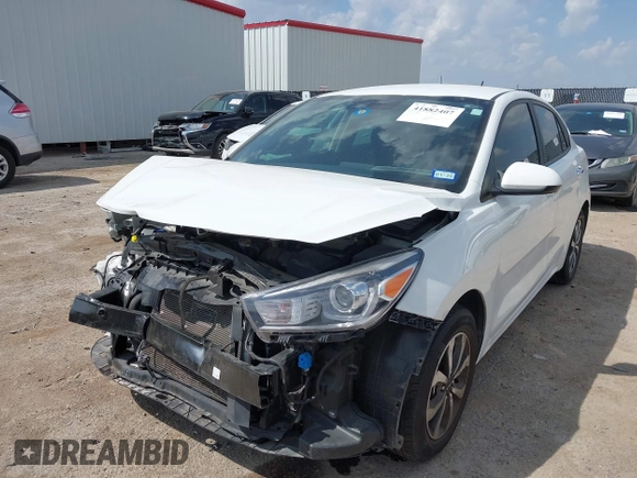 2023 Kia Rio S z VIN 3KPA24AD7PE550899, wystawiony jako IAAI lot #41882407 z przebiegiem 24 966 mil mil oraz . Historia ofert i sprzedaży dostępna na DreamBid. Obrazek 2.