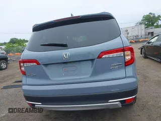 2022 Honda Pilot Touring 7-Passenger with VIN 5FNYF6H68NB056077, listed as a IAAI auction lot 42357338 with 18,193 mi miles and . Bid and sale history available at DreamBid. Image 16.