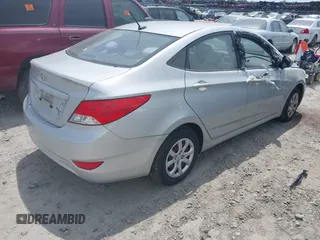 2013 Hyundai Accent GLS with VIN KMHCT4AE3DU403616, listed as a IAAI auction lot 42095208 with 128,523 mi miles. Bid and sale history available at carsss.com. Image 4.