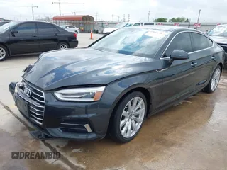 2018 Audi A5 Sportback Premium z VIN WAUANCF5XJA022221, wystawiony jako IAAI lot #42041410 z przebiegiem 94 851 mil mil oraz . Historia ofert i sprzedaży dostępna na DreamBid. Obrazek 2.