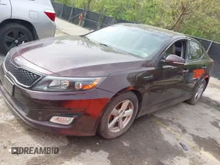 2015 Kia Optima LX with VIN 5XXGM4A79FG494002, listed as a IAAI auction lot 42082041 with 179,076 mi miles. Bid and sale history available at carsss.com. Image 2.