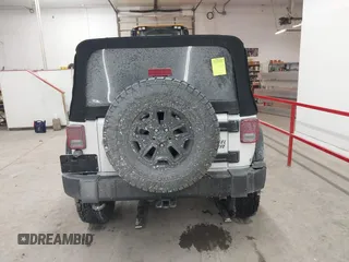 2016 Jeep Wrangler Sport with VIN 1C4AJWAG9GL261958, listed as a IAAI auction lot 41595490 with 32,433 mi miles and . Bid and sale history available at carsss.com. Image 16.