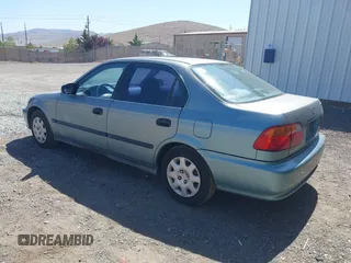 1999 Honda Civic LX z VIN 2HGEJ667XXH575496, wystawiony jako IAAI lot #42372107 z przebiegiem 175 154 mil mil oraz . Historia ofert i sprzedaży dostępna na DreamBid. Obrazek 3.