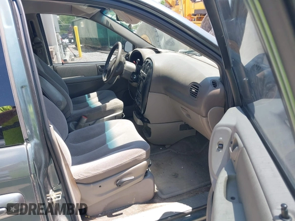 2003 Chrysler Town & Country LX with VIN 2C4GP44R53R385043, listed as a IAAI auction lot 42130516 with 252,056 mi miles. Bid and sale history available at carsss.com. Image 5.