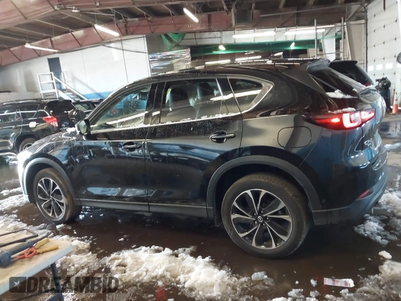 2023 Mazda CX-5 S Premium with VIN JM3KFBDM6P0100301, listed as a IAAI auction lot 41548310 with 21,722 mi miles and . Bid and sale history available at carsss.com. Image 14.