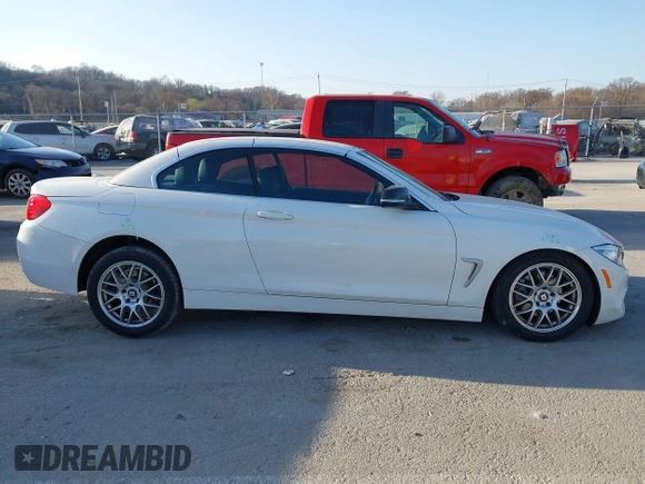 2015 BMW 4 Series 428i xDrive with VIN WBA3T1C51FP821140, listed as a IAAI auction lot 41802697 with 95,232 mi miles and . Bid and sale history available at carsss.com. Image 13.