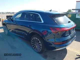 2019 Audi e-tron Prestige with VIN WA1VABGE0KB009718, listed as a IAAI auction lot 42336983 with 54,871 mi miles and . Bid and sale history available at DreamBid. Image 3.