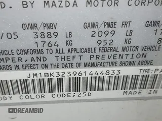 2006 Mazda Mazda3 s Grand Touring with VIN JM1BK323961444833, listed as a IAAI auction lot 41778340 with 149,631 mi miles. Bid and sale history available at carsss.com. Image 9.