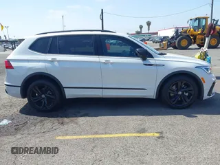 2024 Volkswagen Tiguan SE R-Line Black with VIN 3VVCB7AX7RM085619, listed as a IAAI auction lot 42325566 with 10,615 mi miles and . Bid and sale history available at DreamBid. Image 13.