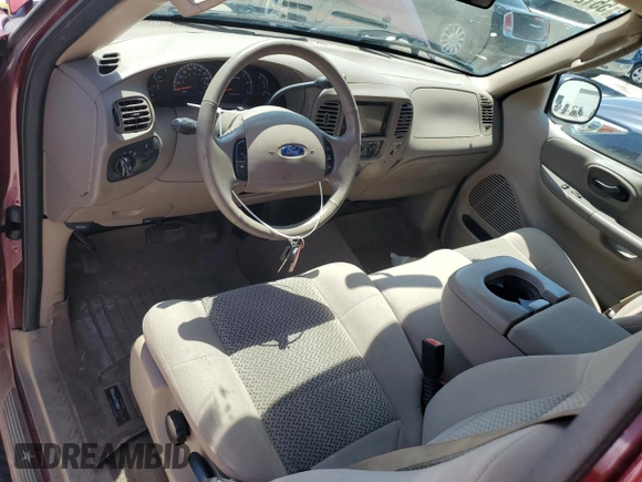 2003 Ford F-150 XL z VIN 1FTRX17L03NA41275, wystawiony jako Copart lot #55125625 z przebiegiem 206 919 mil mil oraz Szkoda całkowita • Salvage title. Historia ofert i sprzedaży dostępna na DreamBid. Obrazek 8.