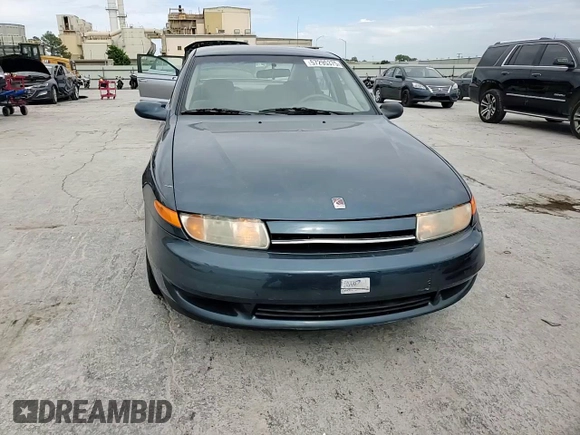 2002 Saturn LS z VIN 1G8JU54F12Y528956, wystawiony jako Copart lot #57295375 z przebiegiem 89 879 mil mil oraz Szkoda całkowita • Salvage title. Historia ofert i sprzedaży dostępna na DreamBid. Obrazek 13.