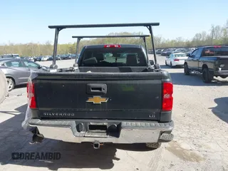 2019 Chevrolet Silverado 1500 LT with VIN 2GCVKPEC5K1140418, listed as a IAAI auction lot 42126724 with 113,381 mi miles and . Bid and sale history available at DreamBid. Image 16.