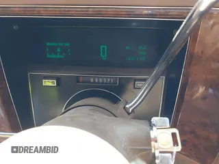 1992 Cadillac Brougham z VIN 1G6DW5477NR702648, wystawiony jako IAAI lot #41863168 z przebiegiem 108 158 mil mil oraz . Historia ofert i sprzedaży dostępna na DreamBid. Obrazek 7.