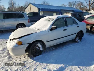 1999 Mazda Protege DX with VIN JM1BJ2220X0122397, listed as a Copart auction lot 41576895 with 180,788 mi miles and Salvage Title. Bid and sale history available at DreamBid. Image 1.