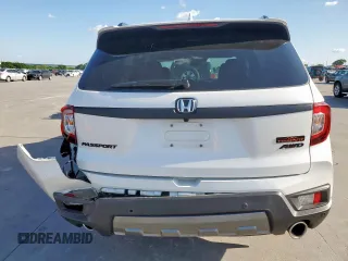 2023 Honda Passport TrailSport with VIN 5FNYF8H64PB007652, listed as a Copart auction lot 54064025 with 22,870 mi miles and Salvage title. Bid and sale history available at DreamBid. Image 6.