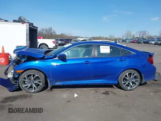 2018 Honda Civic Si z VIN 2HGFC1E52JH709085, wystawiony jako IAAI lot #42069894 z przebiegiem 65 427 mil mil oraz . Historia ofert i sprzedaży dostępna na DreamBid. Obrazek 14.