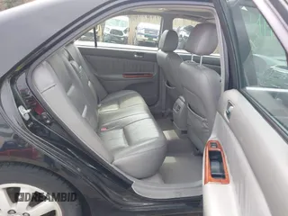 2004 Toyota Camry LE with VIN 4T1BF30K34U080477, listed as a IAAI auction lot 41956998 with 135,441 mi miles. Bid and sale history available at carsss.com. Image 8.