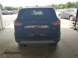 2013 Ford Escape SEL с VIN 1FMCU9HXXDUD63553, выставлен на аукционе Copart как лот 60908565 с пробегом 150 132 миль миль и Списание • Salvage title. История ставок и продаж доступна на DreamBid. Изображение 6.