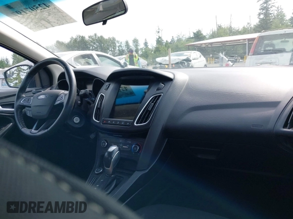 2015 Ford Focus SE with VIN 1FADP3F20FL269846, listed as a IAAI auction lot 42507197 with 143,496 mi miles and . Bid and sale history available at DreamBid. Image 5.