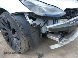 2021 Tesla Model 3 Performance with VIN 5YJ3E1EC2MF096681, listed as a IAAI auction lot 42068782 with 34,852 mi miles and . Bid and sale history available at DreamBid. Image 22.