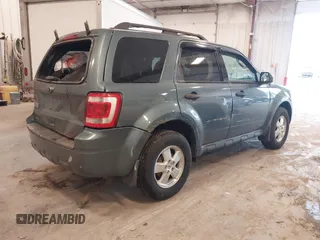 2012 Ford Escape XLT with VIN 1FMCU0D70CKC11664, listed as a IAAI auction lot 42280506 with 184,034 mi miles and . Bid and sale history available at DreamBid. Image 4.