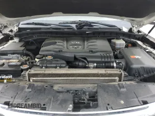 2012 Infiniti QX56 7-passenger z VIN JN8AZ2NE0C9022997, wystawiony jako Copart lot #58497615 z przebiegiem Nie podano mil oraz Tytuł czysty. Historia ofert i sprzedaży dostępna na DreamBid. Obrazek 12.