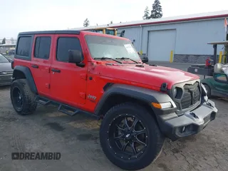 2019 Jeep Wrangler Unlimited Sport S z VIN 1C4HJXDN4KW637889, wystawiony jako IAAI lot #41675162 z przebiegiem 150 098 mil mil oraz . Historia ofert i sprzedaży dostępna na DreamBid. Obrazek 1.