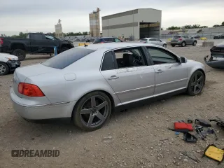 2004 Volkswagen Phaeton V8 z VIN WVWAF63D848008231, wystawiony jako Copart lot #58247645 z przebiegiem 130 457 mil mil oraz Czysty tytuł • Clean title. Historia ofert i sprzedaży dostępna na DreamBid. Obrazek 3.