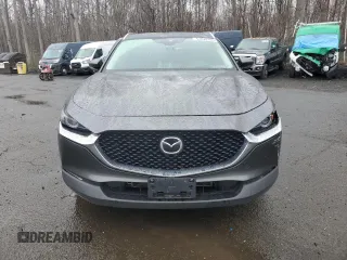 2022 Mazda CX-30 S Premium with VIN 3MVDMBDLXNM445466, listed as a Copart auction lot 51820105 with 65,417 mi miles and Salvage title. Bid and sale history available at DreamBid. Image 5.