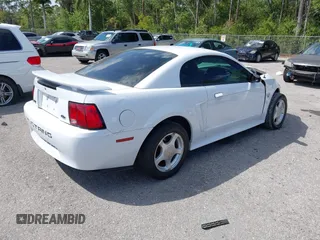 2004 Ford Mustang Standard with VIN 1FAFP40404F103699, listed as a IAAI auction lot 41804765 with 193,986 mi miles. Bid and sale history available at carsss.com. Image 4.