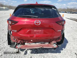 2018 Mazda CX-5 Touring with VIN JM3KFBCM4J0311022, listed as a Copart auction lot 50638485 with 85,927 mi miles and Salvage Title. Bid and sale history available at DreamBid. Image 6.