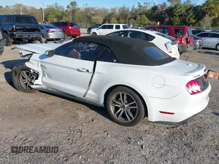 2015 Ford Mustang EcoBoost Premium with VIN 1FATP8UH5F5367579, listed as a IAAI auction lot 41680764 with 120,060 mi miles and . Bid and sale history available at DreamBid. Image 3.