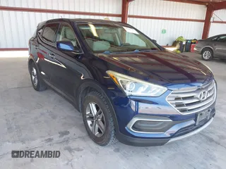 2018 Hyundai Santa Fe 2.4L z VIN 5XYZTDLB9JG559271, wystawiony jako IAAI lot #42421591 z przebiegiem 152 044 mil mil oraz . Historia ofert i sprzedaży dostępna na DreamBid. Obrazek 1.