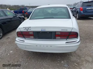 1999 Buick Park Avenue Ultra with VIN 1G4CU5217X4658627, listed as a IAAI auction lot 42013174 with 148,856 mi miles. Bid and sale history available at carsss.com. Image 16.