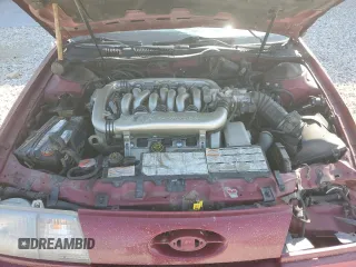 1990 Ford Taurus z VIN 1FACP54Y5LA145772, wystawiony jako Copart lot #69129894 z przebiegiem 617 051 mil mil oraz Czysty tytuł • Clean title. Historia ofert i sprzedaży dostępna na DreamBid. Obrazek 11.